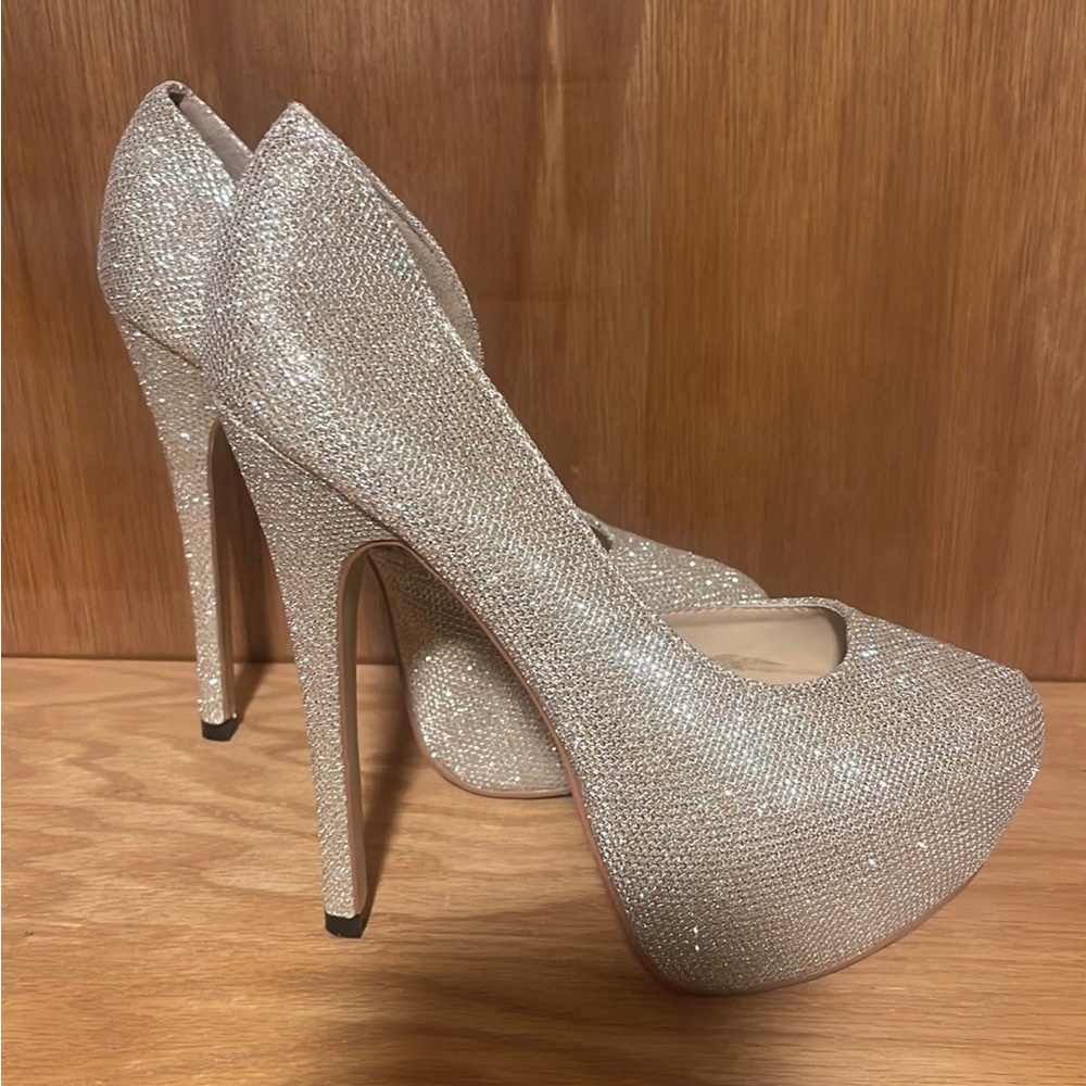Gold chain glitter heels.
